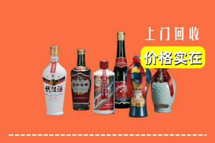 高价收购:来宾上门回收老酒